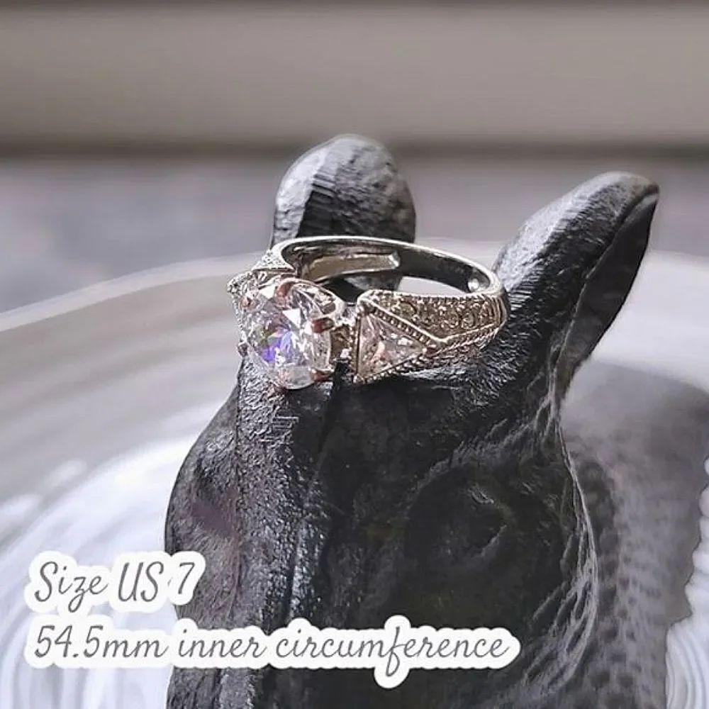 Y2K Avon platinum plated 100 facet CZ silver tone ring